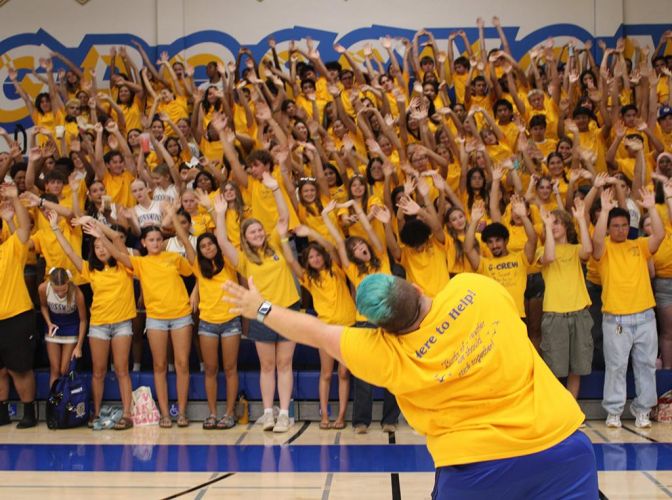 Math Teacher Kristen Loprell Leads G Crew in Warm Up